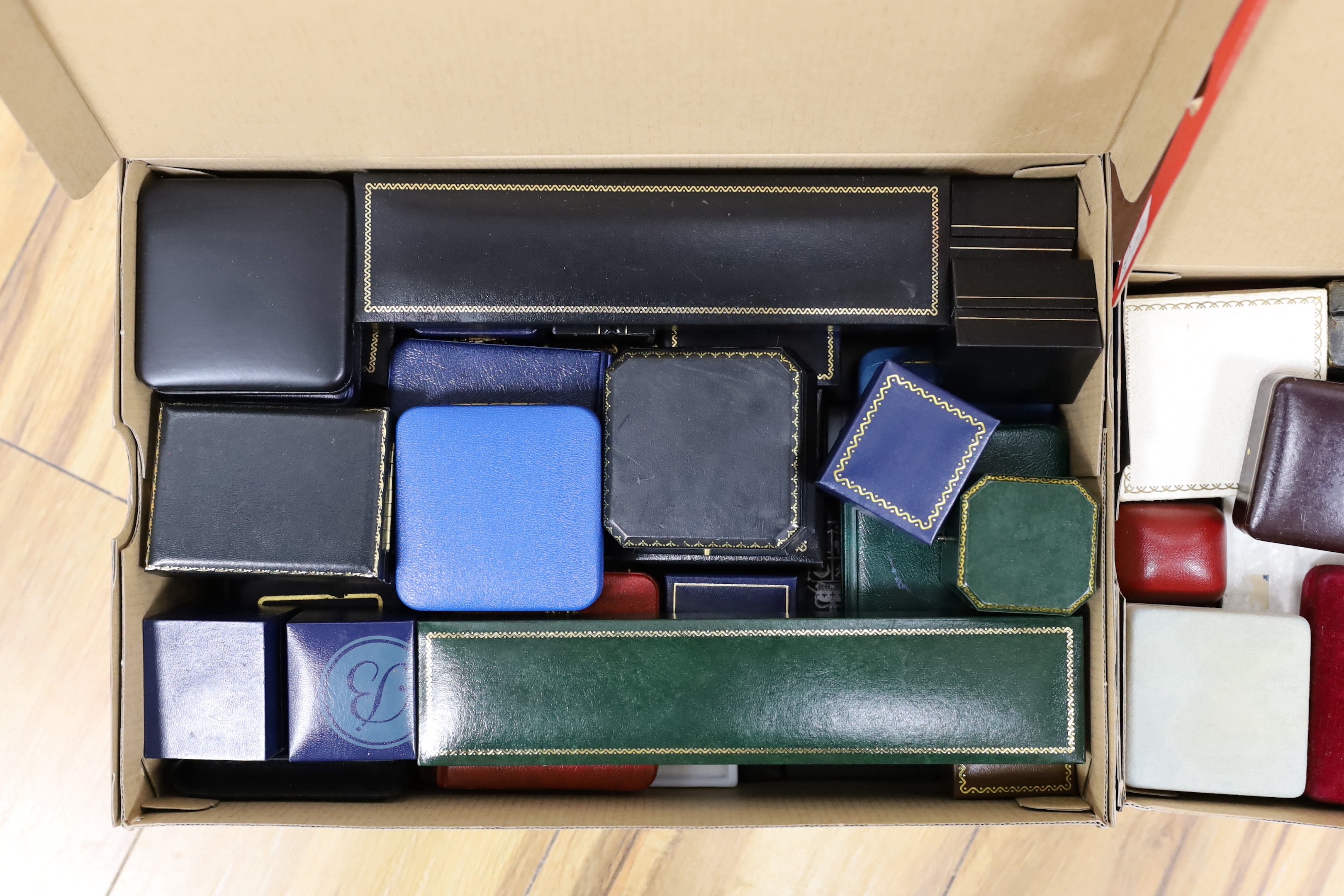 A large quantity of assorted empty jewellery boxes.